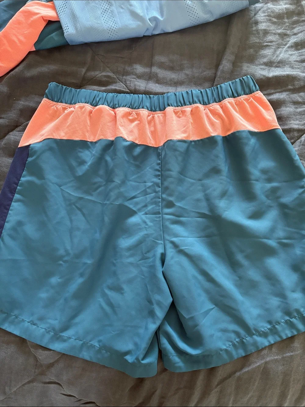 Asics Teal Tennis Shorts and Shirt Set with Coral Accents